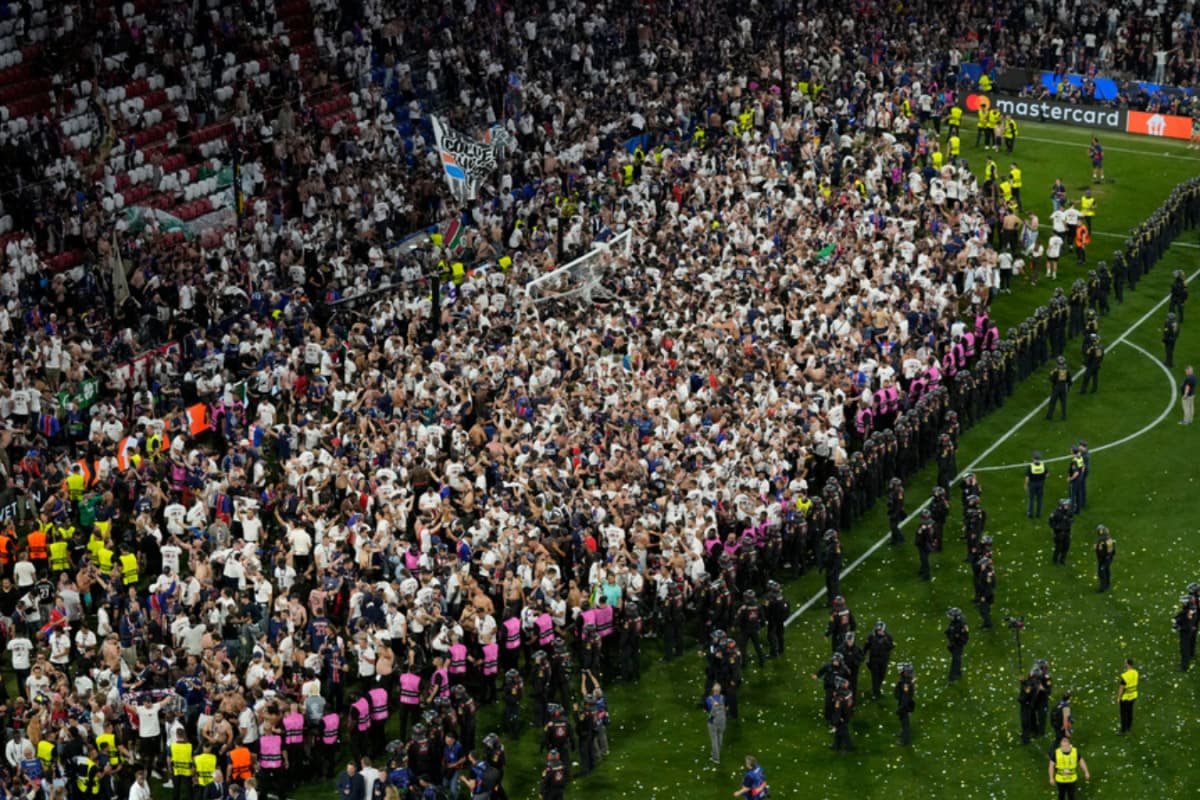 PSG Fans Invade Pitch For Souvenirs Post UEFA Champions League Win | Pictures