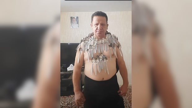 Watch: Man Breaks His Own Record By Balancing 96 Spoons On His Body