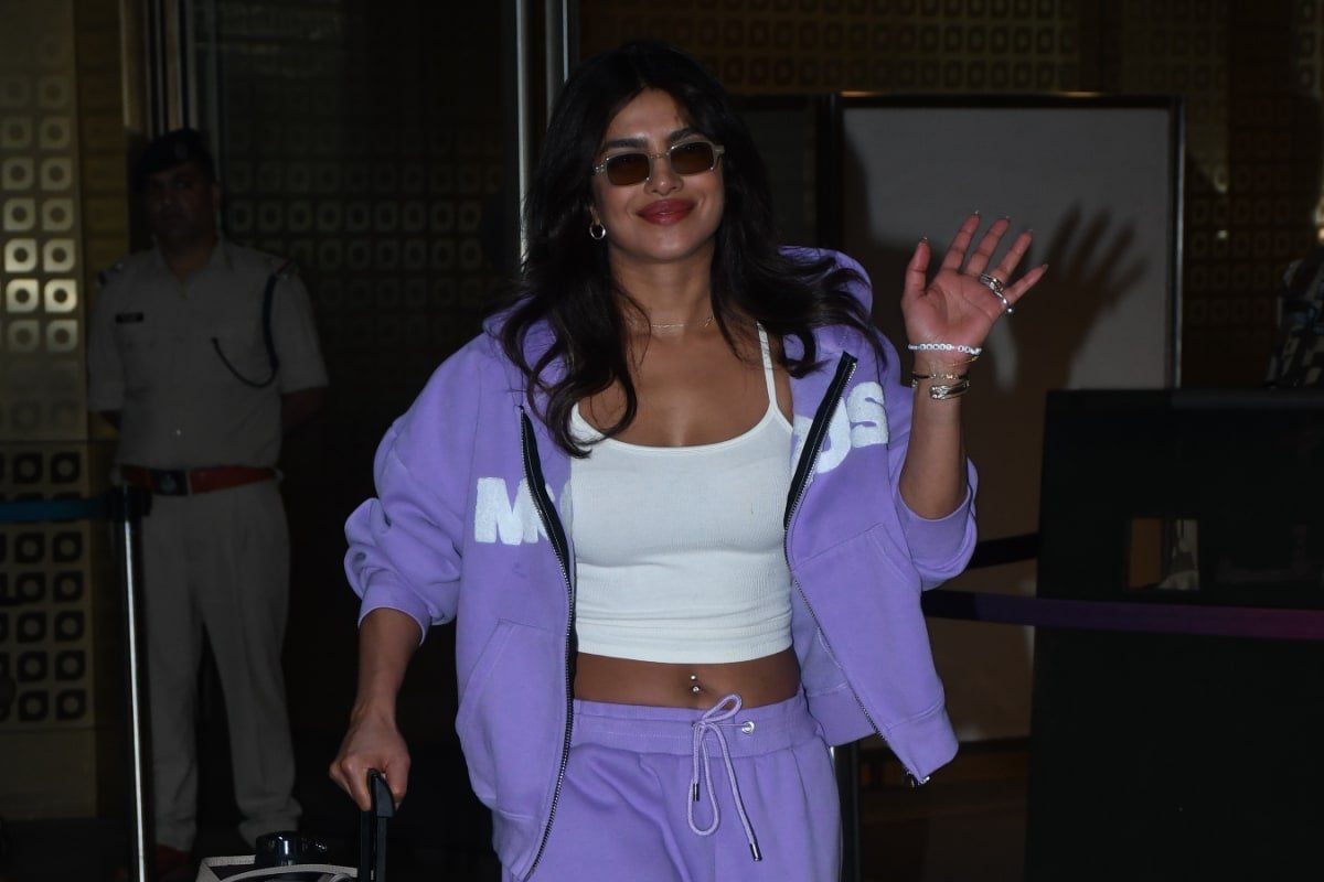 Priyanka Chopra Lands In Mumbai Wearing Stylish Athleisure | Photos