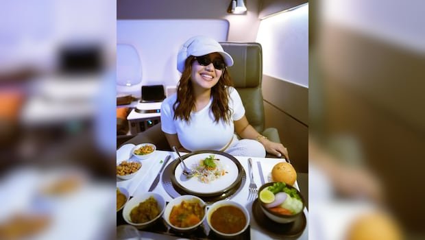 Neha Kakkar Enjoys Lavish In-Flight Meal Before Landing In Australia